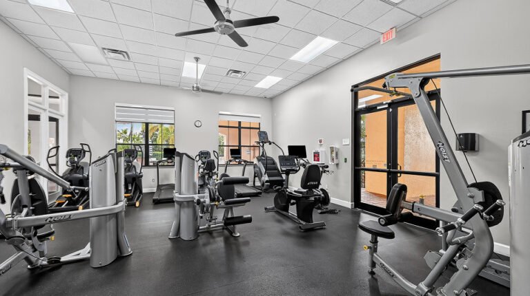 Fitness center with cardio and strength equipment at Valencia Golf & Country Club, Naples FL
