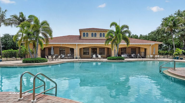 The resort-style pool deck at Valencia Golf & Country Club, Naples FL